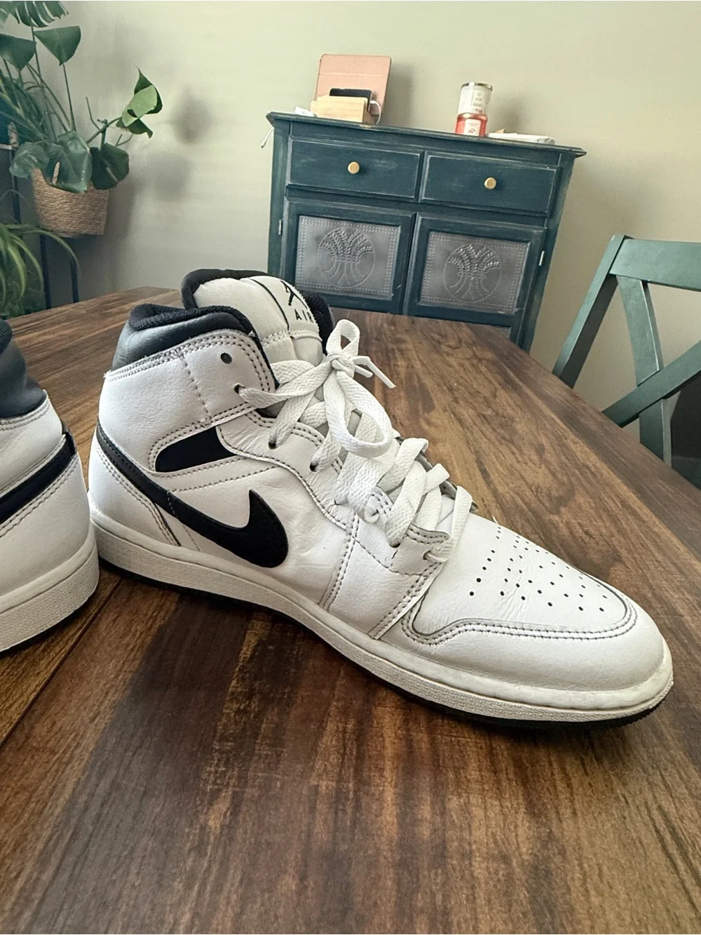 Nike Air Jordan 1 White and Black Mid-Top Sneakers